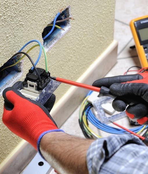 Man Fixing The Wire
