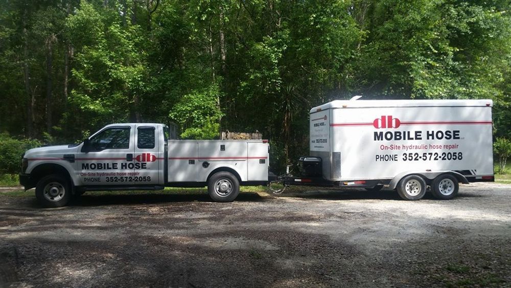 White truck and trailer for 