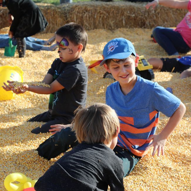 A boy wearing a blue hat with the word thunder on it