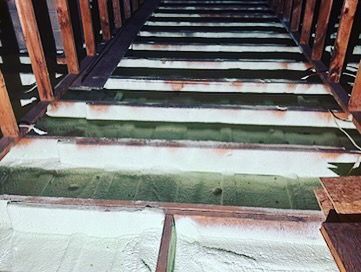 The floor of a building with a lot of foam on it.