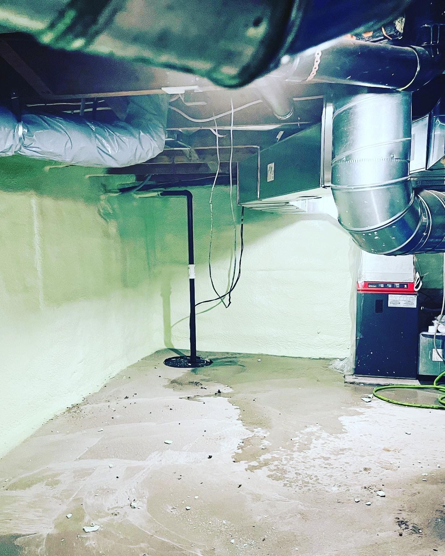 A room with a lot of pipes coming out of the ceiling