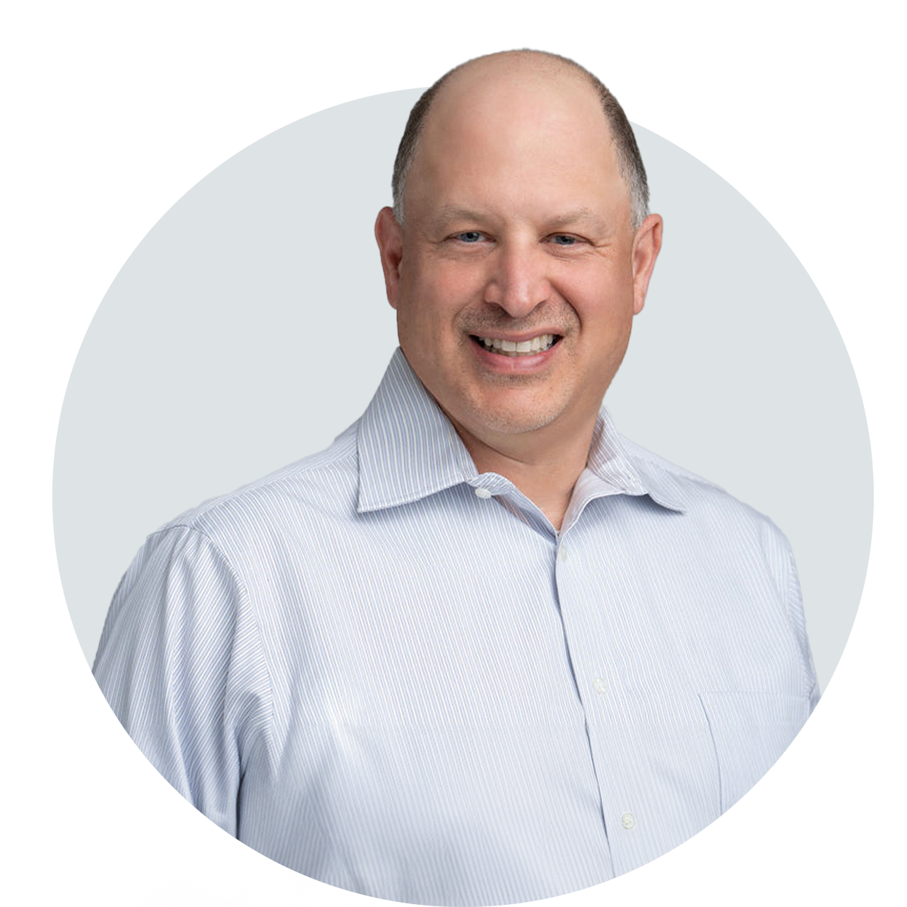 A man in a striped shirt is smiling in a circle.