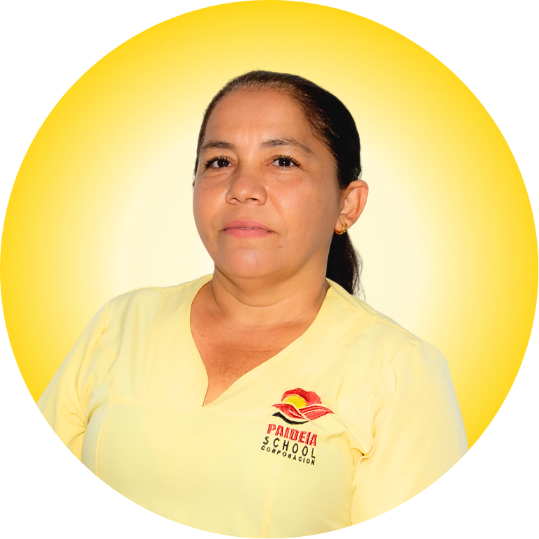 Una mujer vistiendo un uniforme de chef con las palabras escuela paiberia bordadas