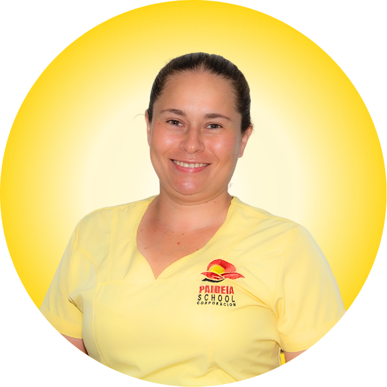 Un joven que llevaba una bata de chef blanca con las palabras Prairie Tech School escritas