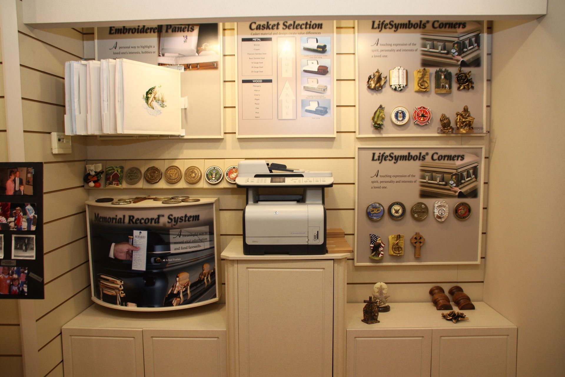 Store display of decorative keychains, buttons, and souvenir items on wall shelves and counters
