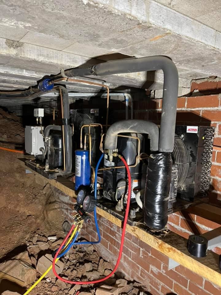 Refrigeration Unit Installed in A Crawl Space with Piping — Canobolas Air in Orange, NSW