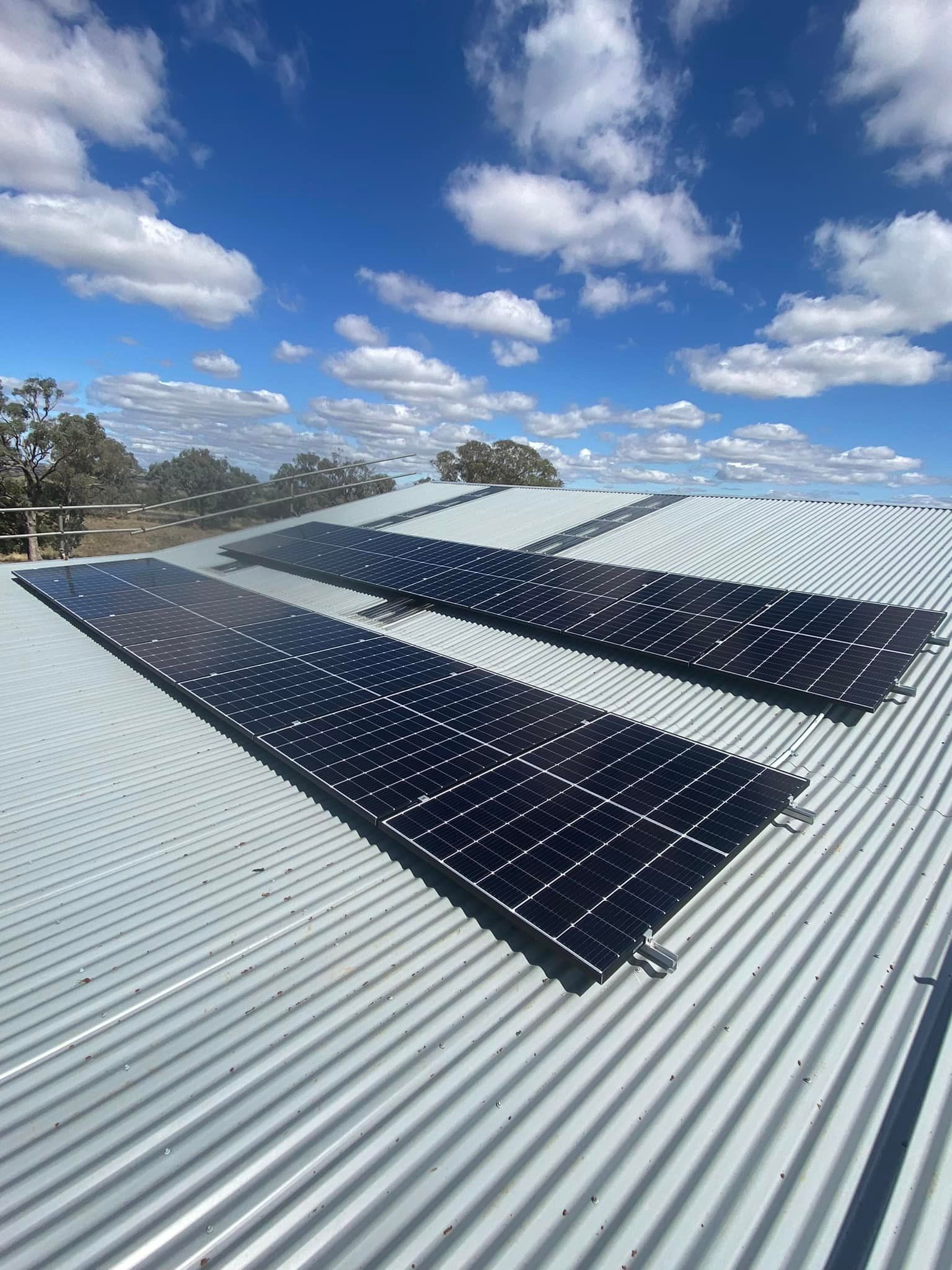 Solar Panels Installed on A Corrugated Metal Roof — Canobolas Air in Cowra, NSW