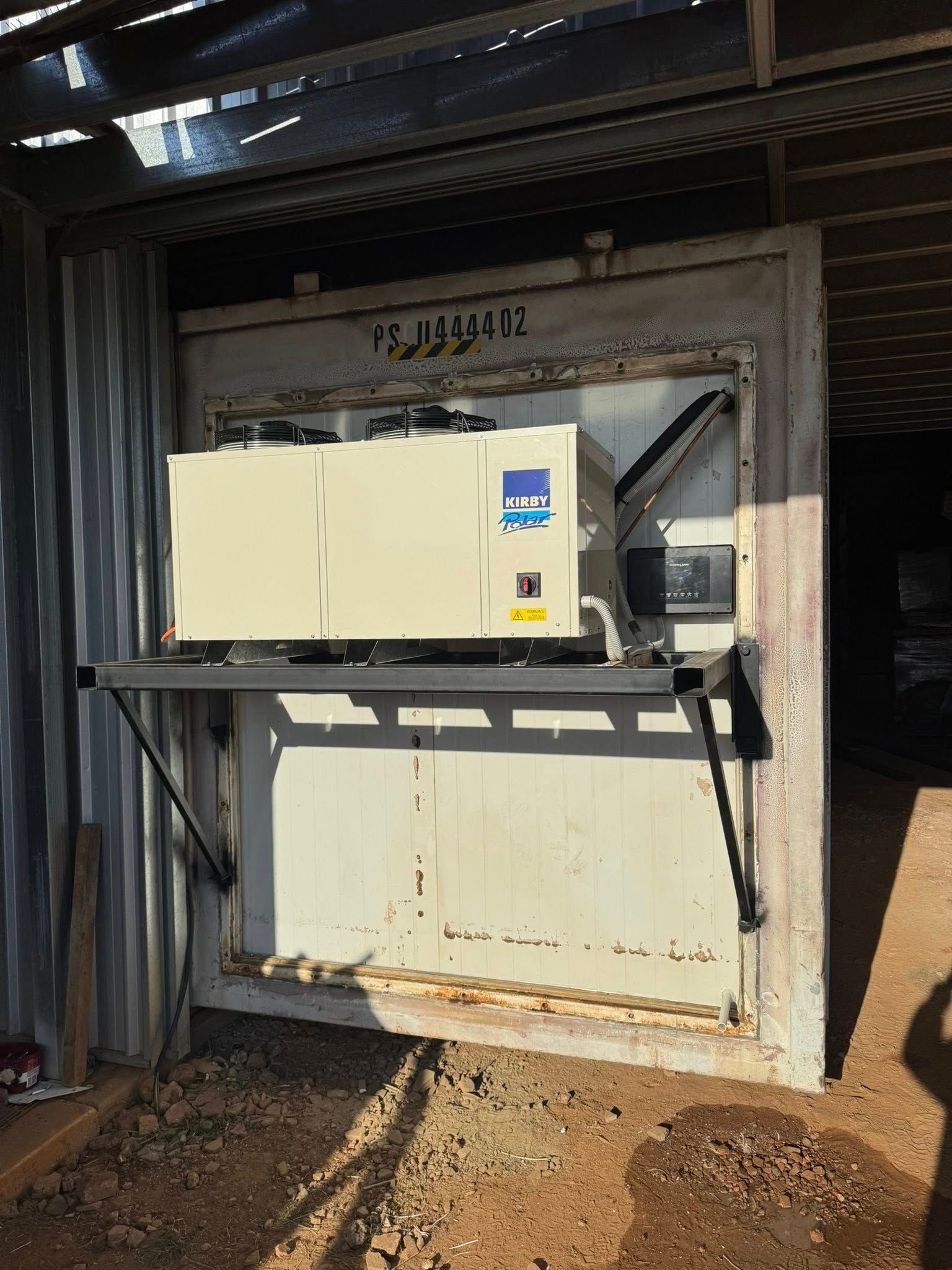 Refrigerated Shipping Container with Cooling Unit Mounted Externally — Canobolas Air in Oberon, NSW