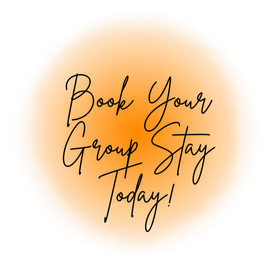 Orange watercolor circle with handwritten text: “Book Your Group Stay Today!”