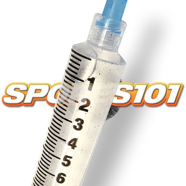 A syringe with numbers 1 through 6 on it for spores
