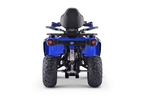 Rear view of a blue ATV with large tires on a white background