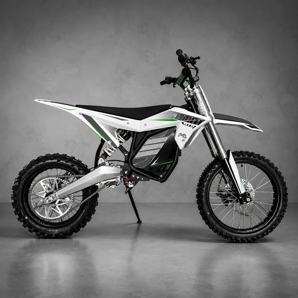 White and black off-road dirt bike in side view on a white background