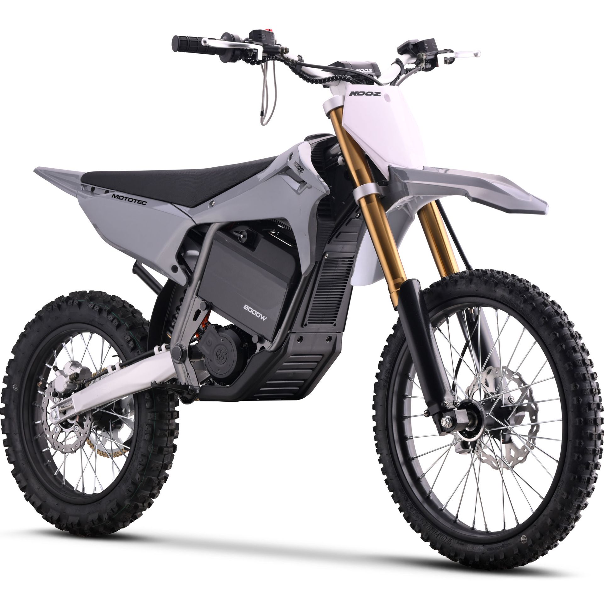 Gray off-road electric dirt bike with knobby tires, gold forks, and black battery pack on a white background