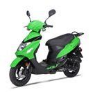 A green scooter is parked on a white background.