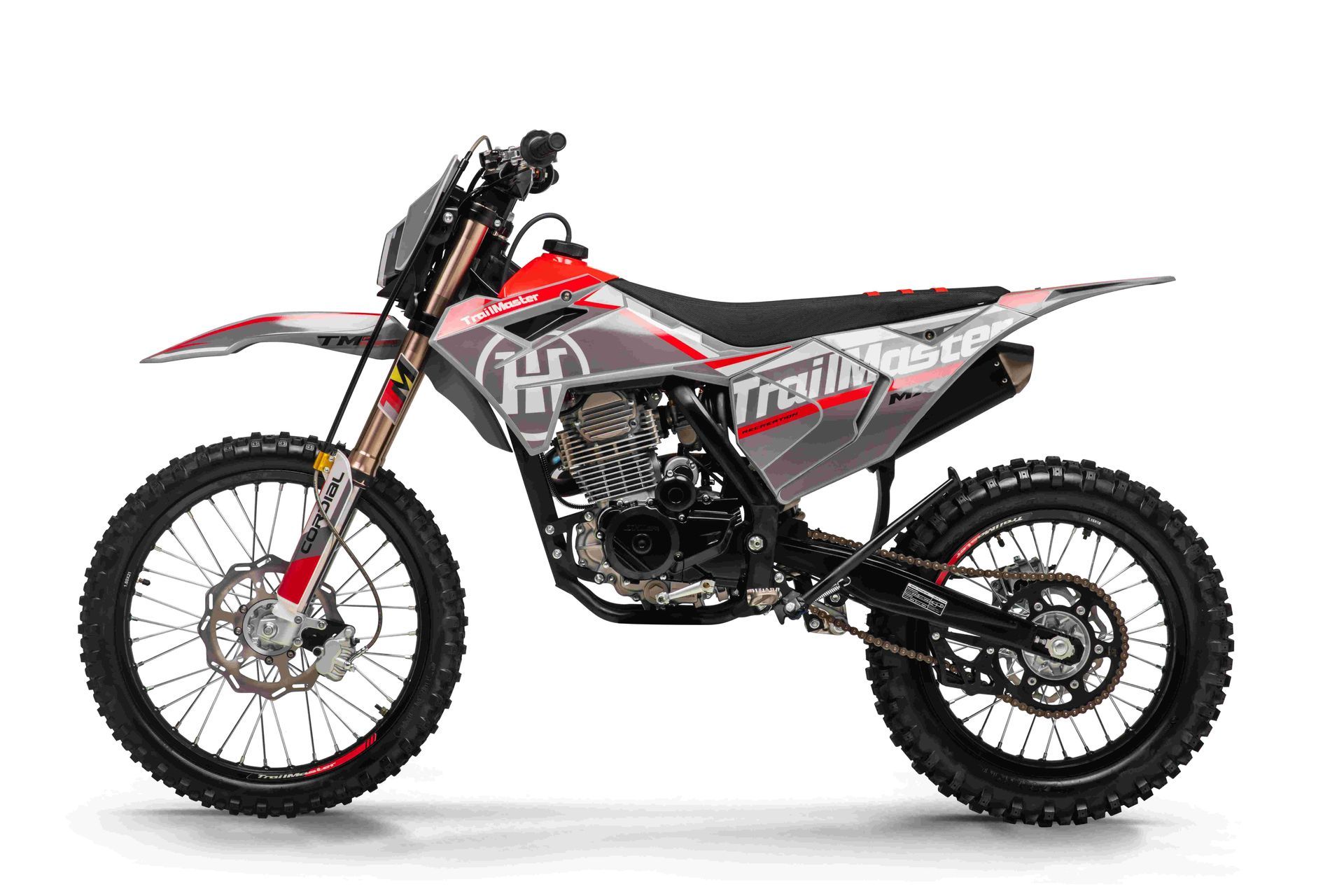 Red and black dirt bike in side view on a white background