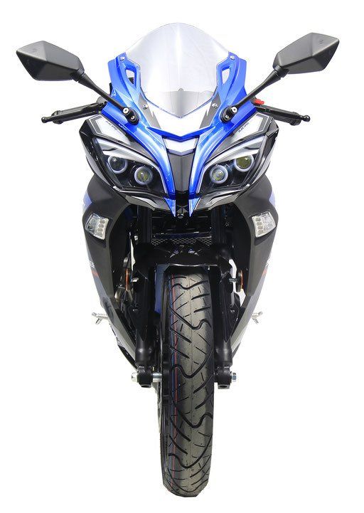 Front view of a blue and black sport motorcycle with dual mirrors and clear windshield