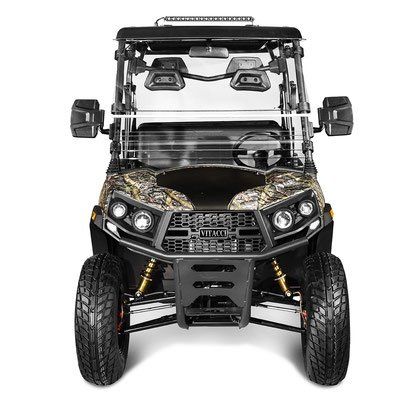 Front view of a black off-road UTV with camo hood and large tires on a white background