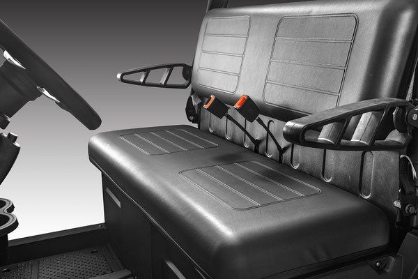 Black utility vehicle bench seat with seatbelts and armrests, shown in a gray interior.