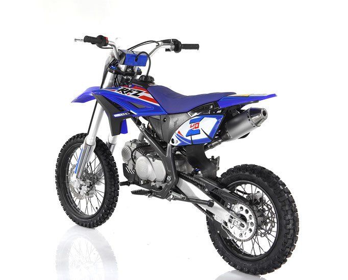 Blue dirt bike with black seat and knobby tires on a white background