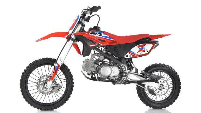 Red and white dirt bike on a white background