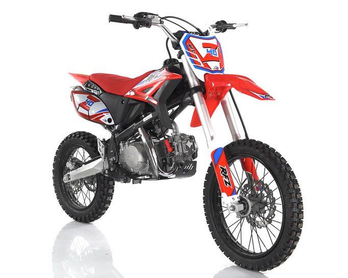 Red and white dirt bike with black tires on a white background