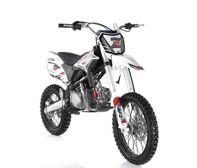 White and black dirt bike on a plain white background, angled slightly to the left
