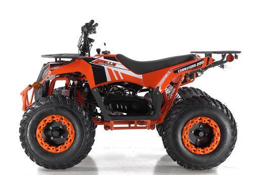 Orange and black four-wheeled ATV on a white background, side view