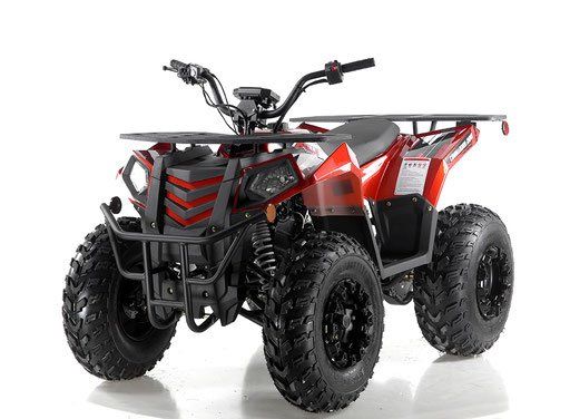 Red and black all-terrain quad bike with rugged tires on a white background