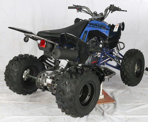 A blue and black atv is sitting on a white surface