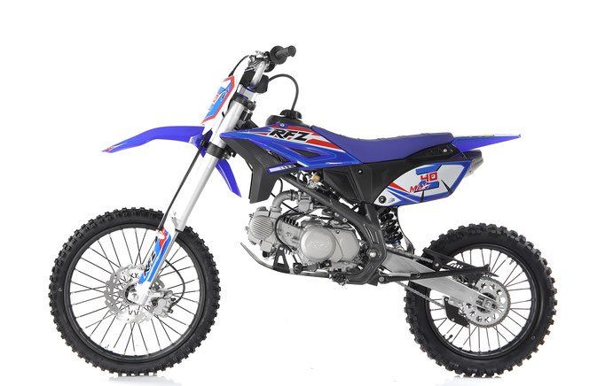 Blue dirt bike on a white background, side view.