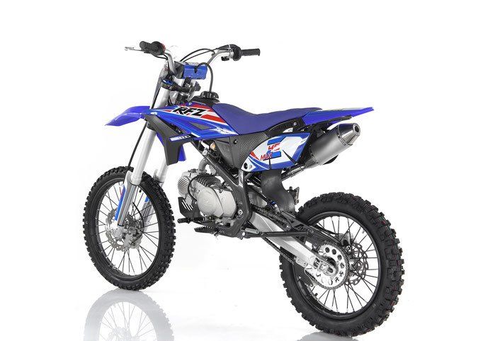 Blue dirt bike on a white background, angled side view