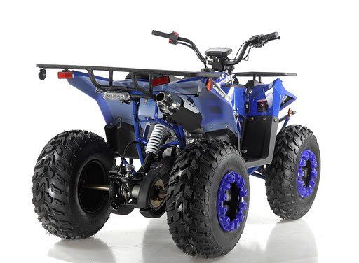 Blue all-terrain quad bike with large knobby tires on a white background