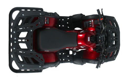 Top-down view of a black and red remote-controlled car chassis with large off-road tires