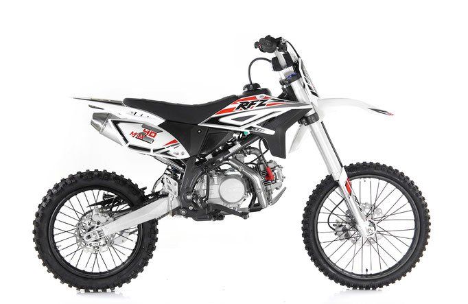 White and black dirt bike with red accents on a white background