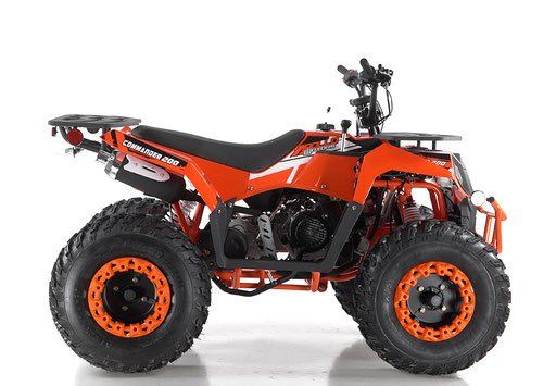 Orange and black all-terrain quad bike on a white background