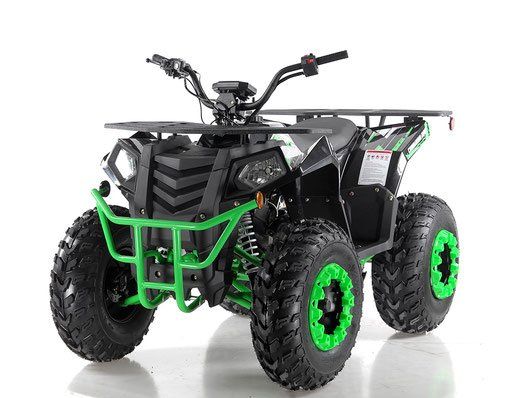 Black and green four-wheeled ATV with bright green wheels on a white background