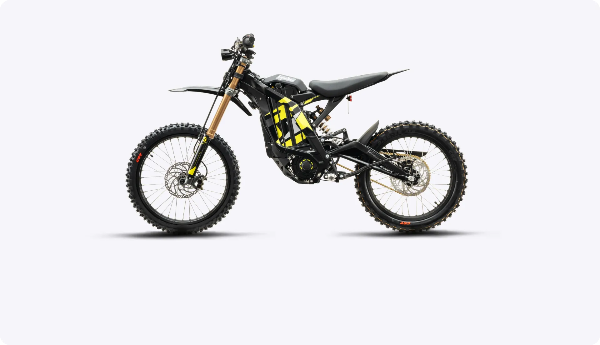 White and black off-road dirt bike in side view on a white background