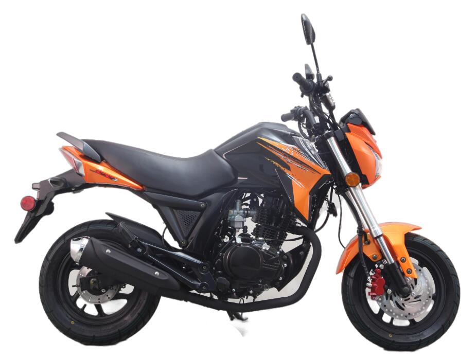 A black and orange motorcycle is parked on a white background.
