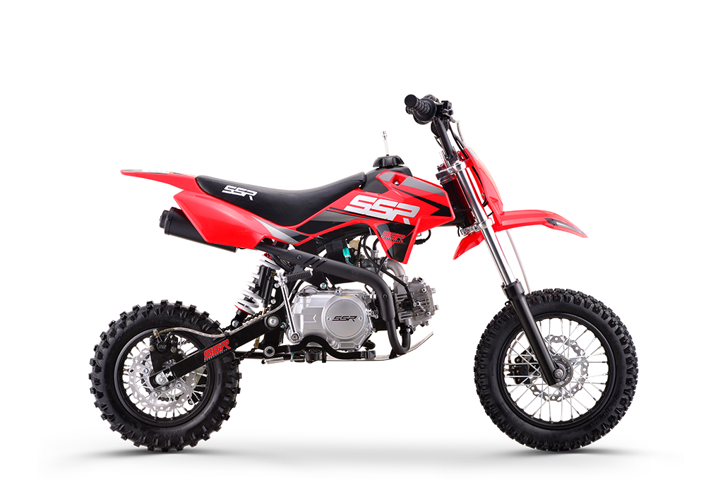 Red dirt bike with black frame and knobby tires on a white background
