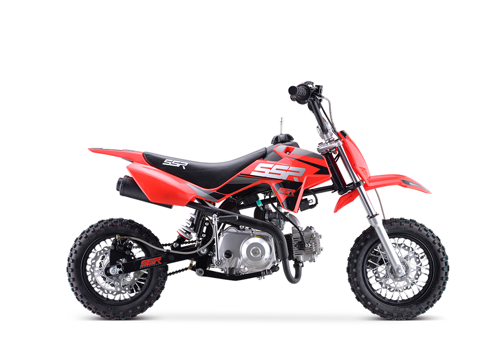 Red dirt bike on a white background, shown in side view.