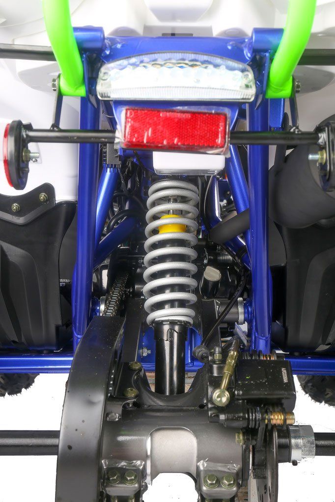 A close up of a shock absorber on a motorcycle.