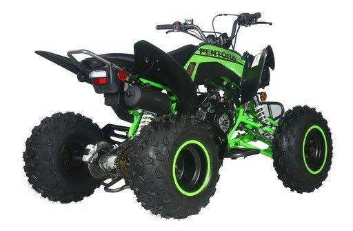 A green and black atv with large tires on a white background.