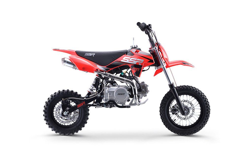 Red and black dirt bike on a white background