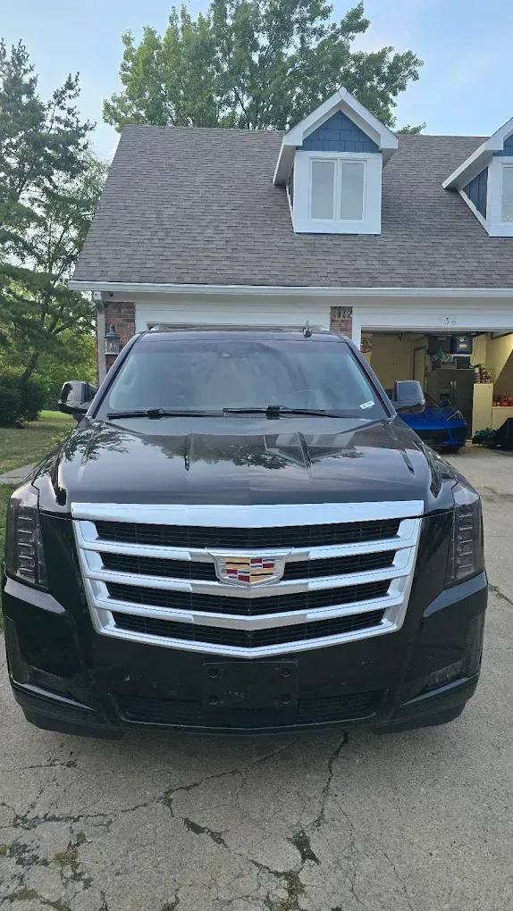 Black SUV Parked | Apex Vehicle Maintenance, Inc.