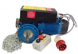 A blue motor with a chain and a switch on a white background.