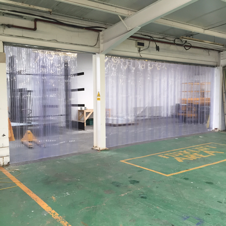 A warehouse with a sign that says priority area