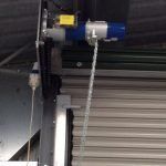 A close up of a machine with water coming out of it.