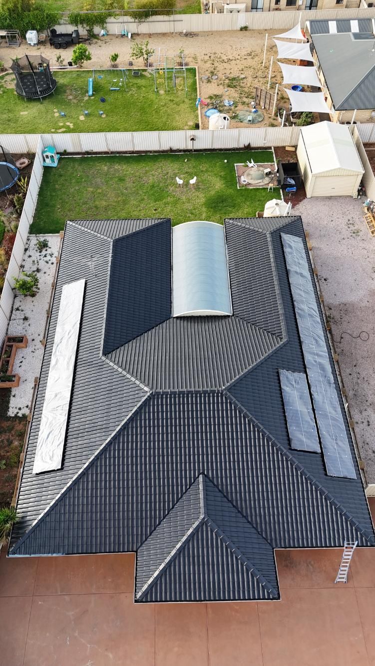 A damanged roof being repaired in Adelaide