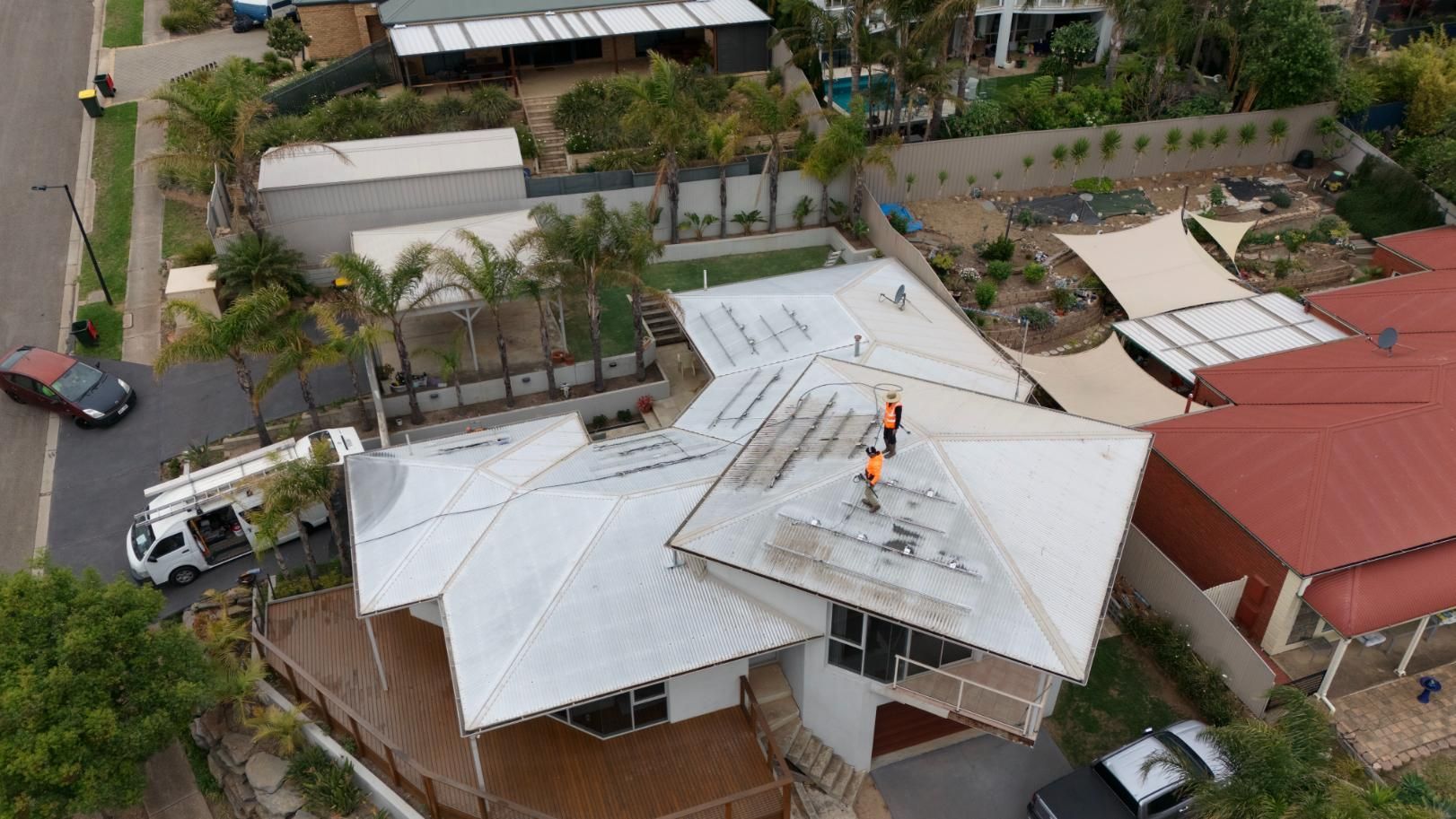 A roof being cleaned in Adelaide