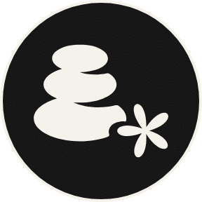 stacked stones with a flower black and white icon